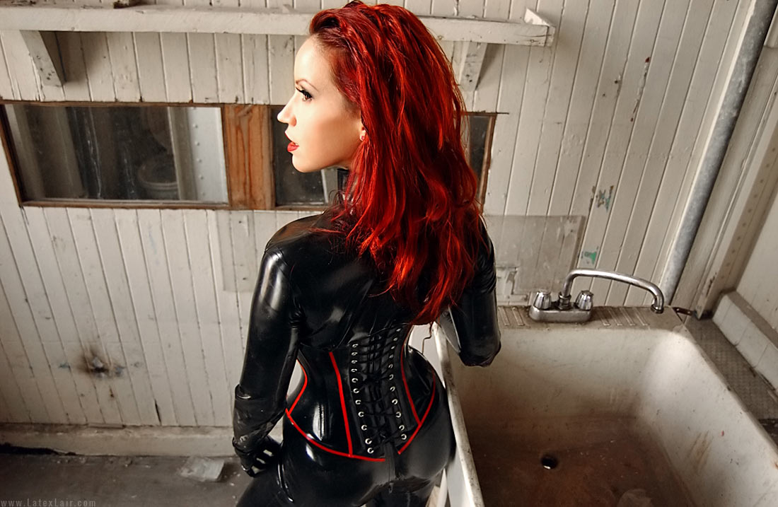 bianca_beauchamp breasts female large_breasts latex long_hair red_hair solo watermark