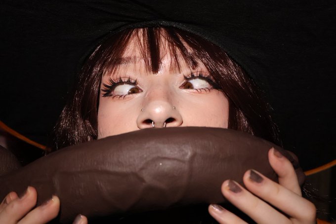 bbc big_dildo black_dildo brown_eyes cock_worship crossed_eyes dildo meme nose_piercing painted_nails sex_toy twitter white_female