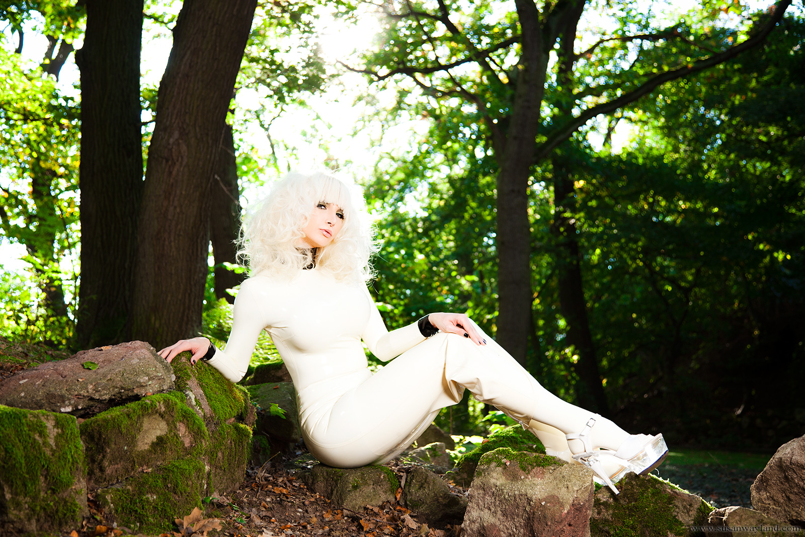 blonde_hair breasts dress female forest large_breasts latex long_hair outside solo susan_wayland watermark
