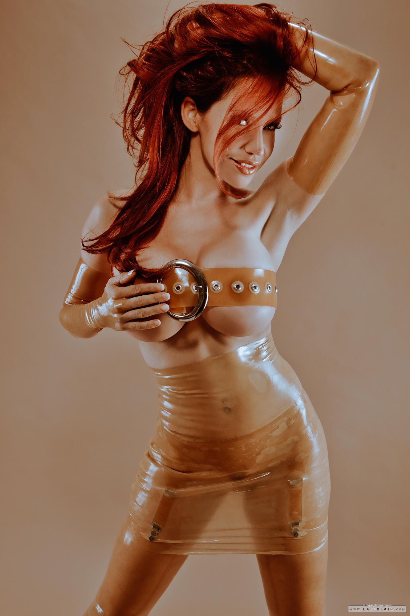 bianca_beauchamp breasts female large_breasts long_hair red_hair solo watermark