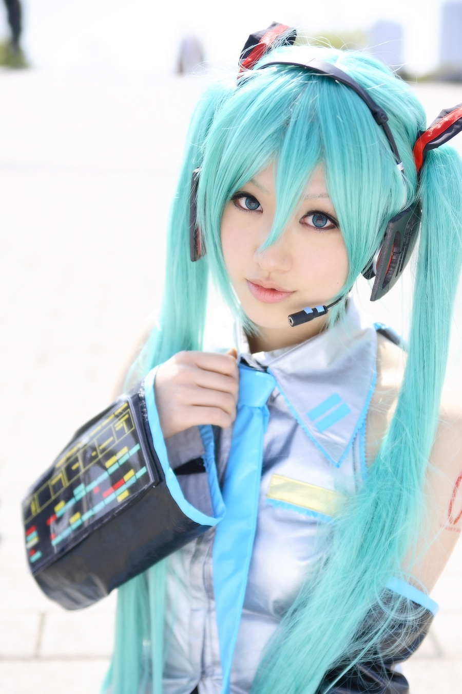 1girl aqua_hair asian breasts cosplay female green_hair hatsune_miku headphones japanese long_hair necktie saya_(cosplayer) solo twintails