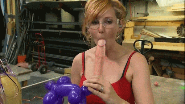1girl animated celebrity clothed dildo dildo_in_mouth fakes female female_only gif glasses kari_byron mythbusters non-nude red_hair uncensored white