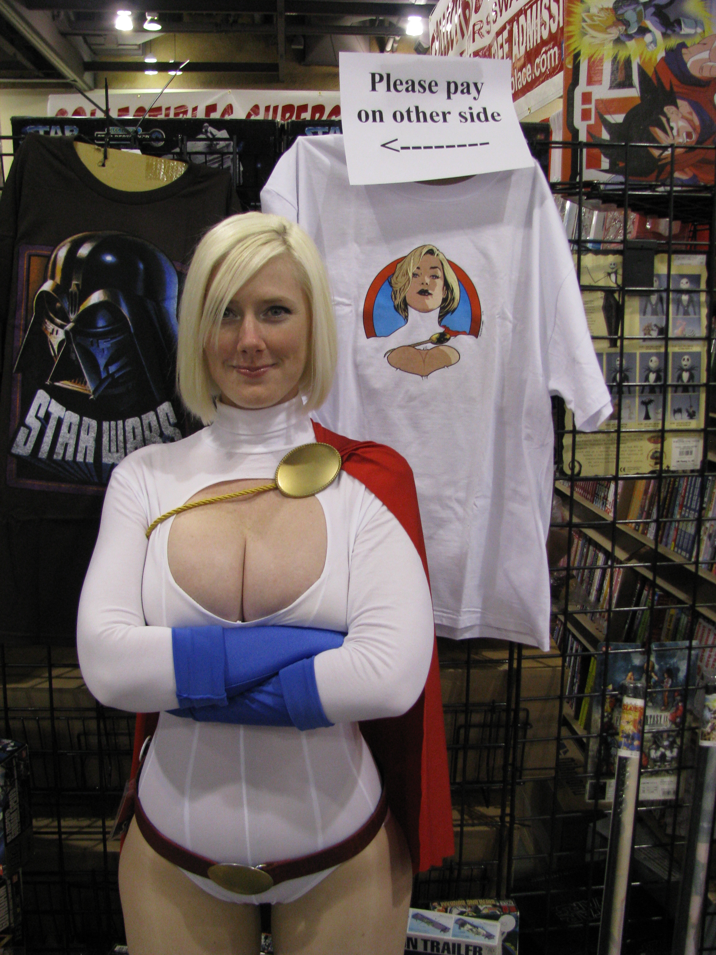 belt big_breasts blonde_hair blue_eyes breasts cape caucasian cleavage cleavage_cutout cosplay dc dc_comics elbow_gloves gloves huge_breasts leotard non-nude pantyhose photo power_girl real real_person short_hair smile white
