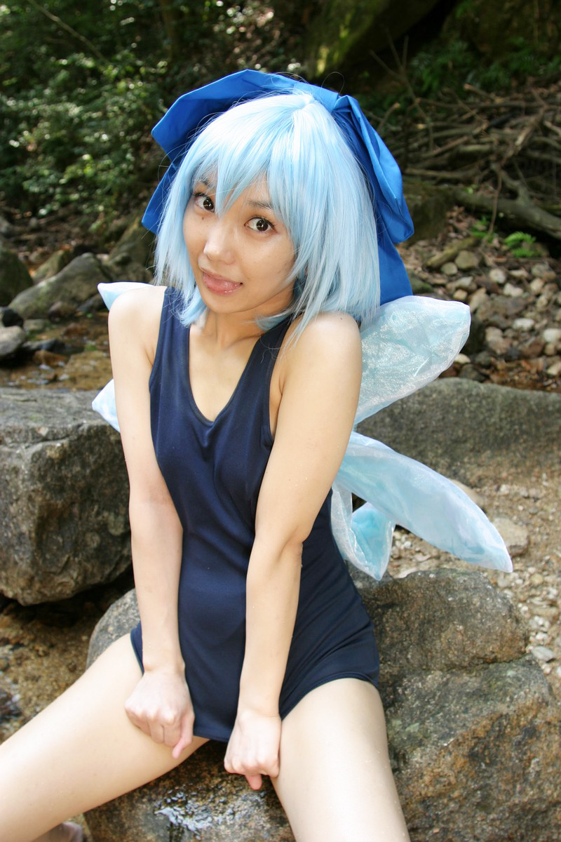 1girl aqua_hair asian barefoot breasts cirno cosplay female japanese lenfried long_hair one-piece_swimsuit outside ribbon solo swimsuit touhou water watermark wet wings