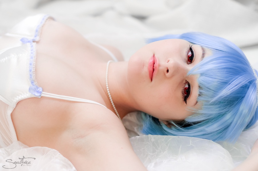 1girl armpits blue_hair breasts cosplay cute lingerie lying lying_down negligee neon_genesis_evangelion pale red_eyes rei_ayanami soft solo youronlydoll