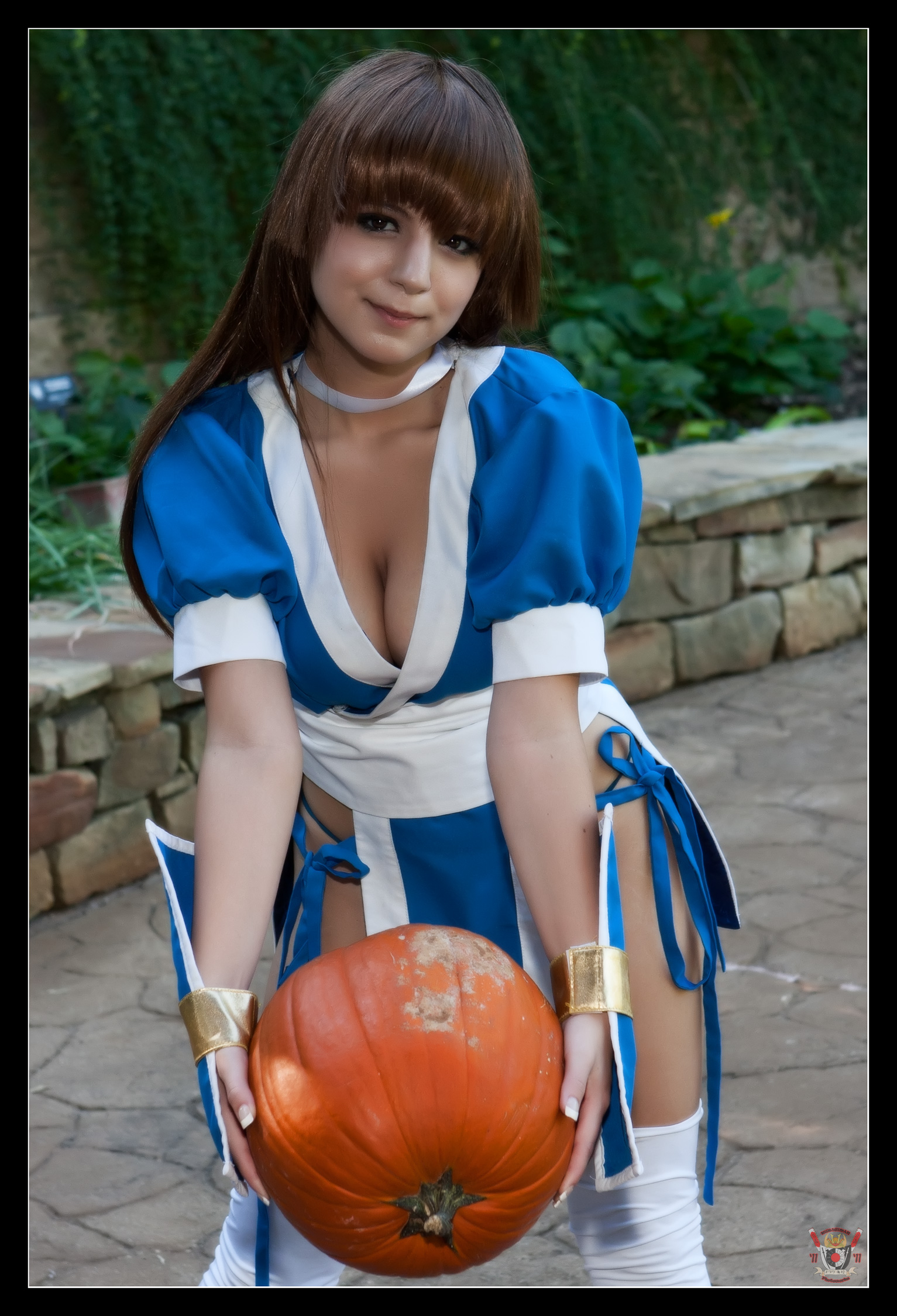 boots breasts brown_hair bunny_ayumi cleavage cosplay female high_heels large_breasts long_hair outside pumpkin solo
