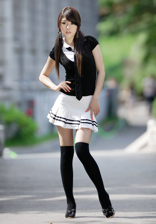 asian brown_hair female long_hair necktie non-nude outside pigtails shoes skirt solo thighhighs