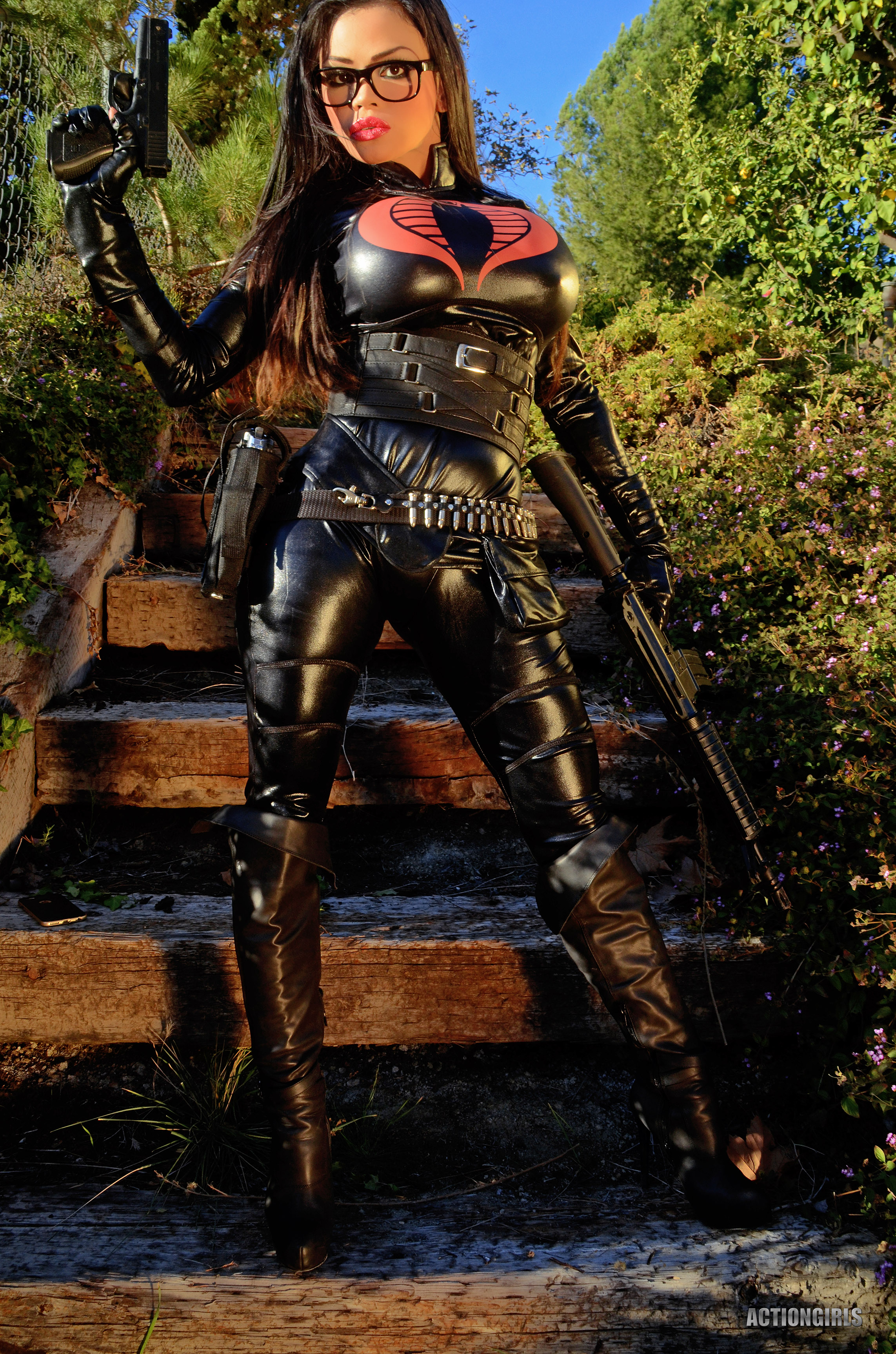 black_hair breasts corset cosplay female glasses gun high_heels latex long_hair shoes solo weapon