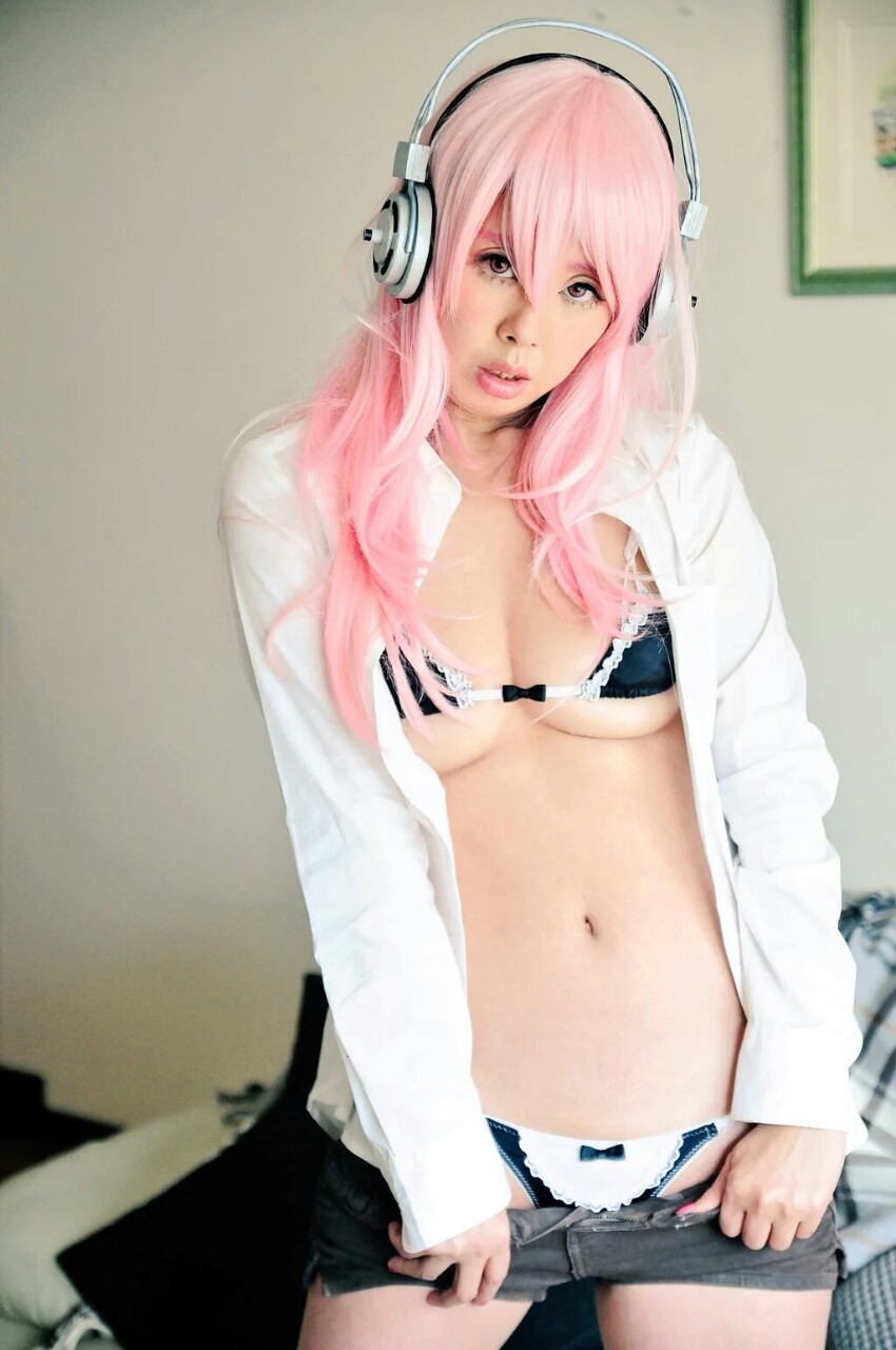 1girl bra breasts cleavage cosplay female headphones nitroplus panties photo pink_hair solo super_sonico