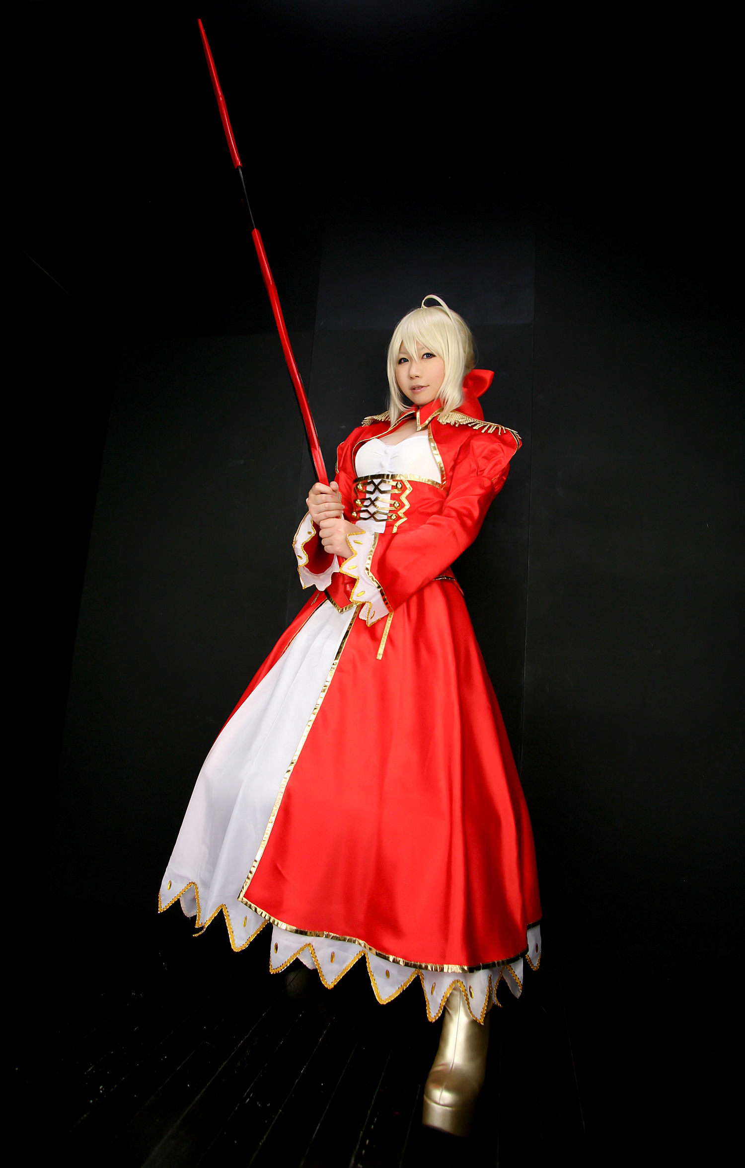 asian blonde_hair boots breasts cosplay dress female high_heels long_hair solo sword