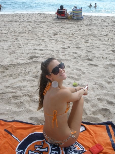 beach bikini brunette female legs_pulled_up long_hair looking_at_viewer photo ponytail sunglasses
