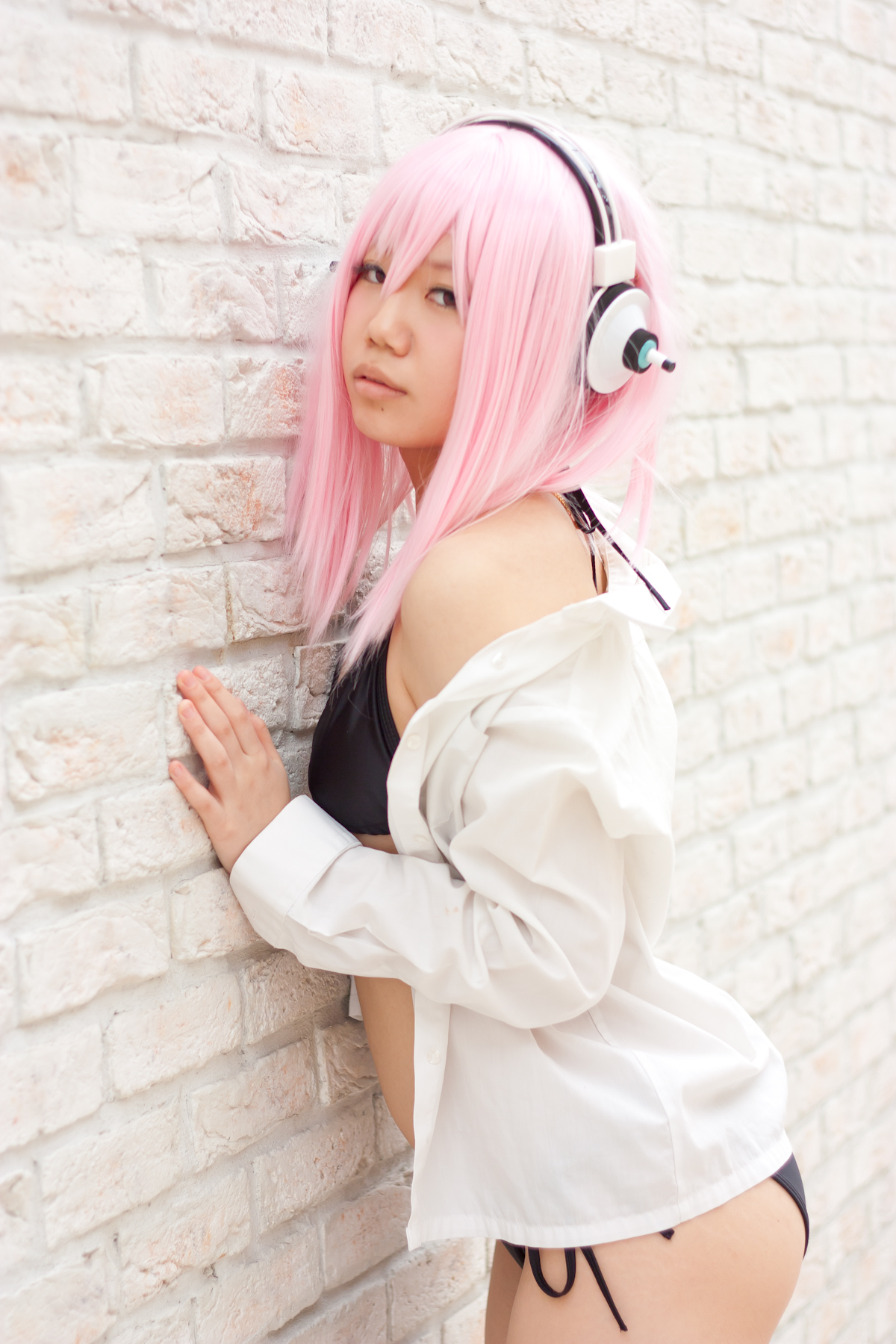 asian bikini breasts cosplay female headphones long_hair pink_hair solo