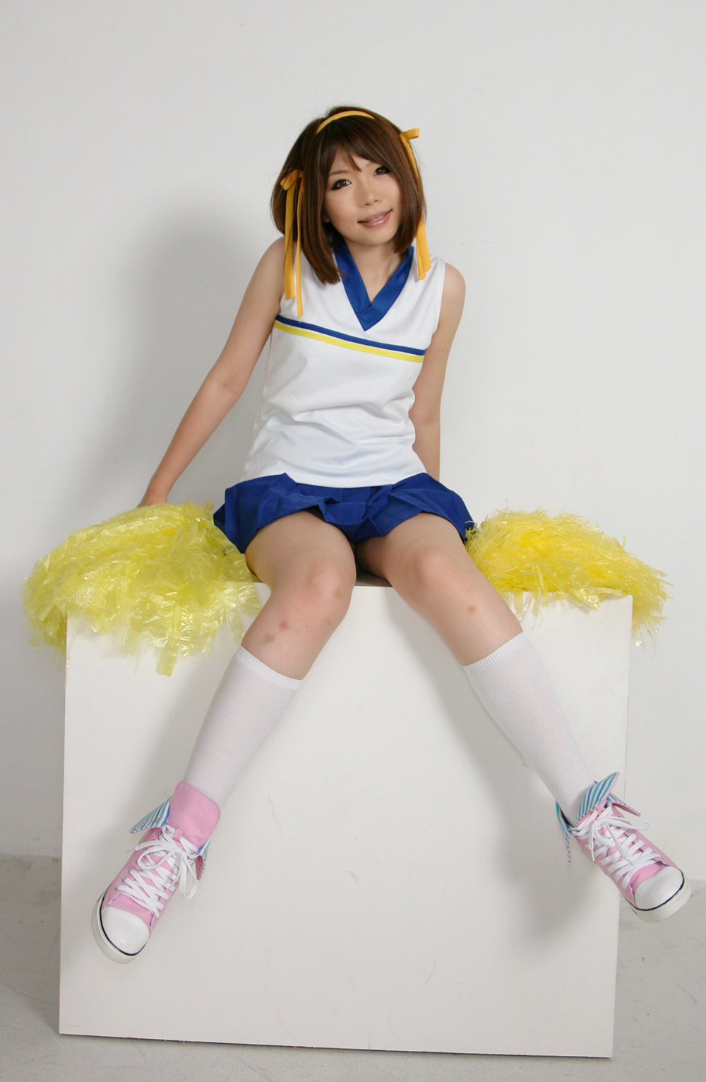 asian breasts brown_hair cheerleader cosplay female hairband panties shoes short_hair skirt socks solo