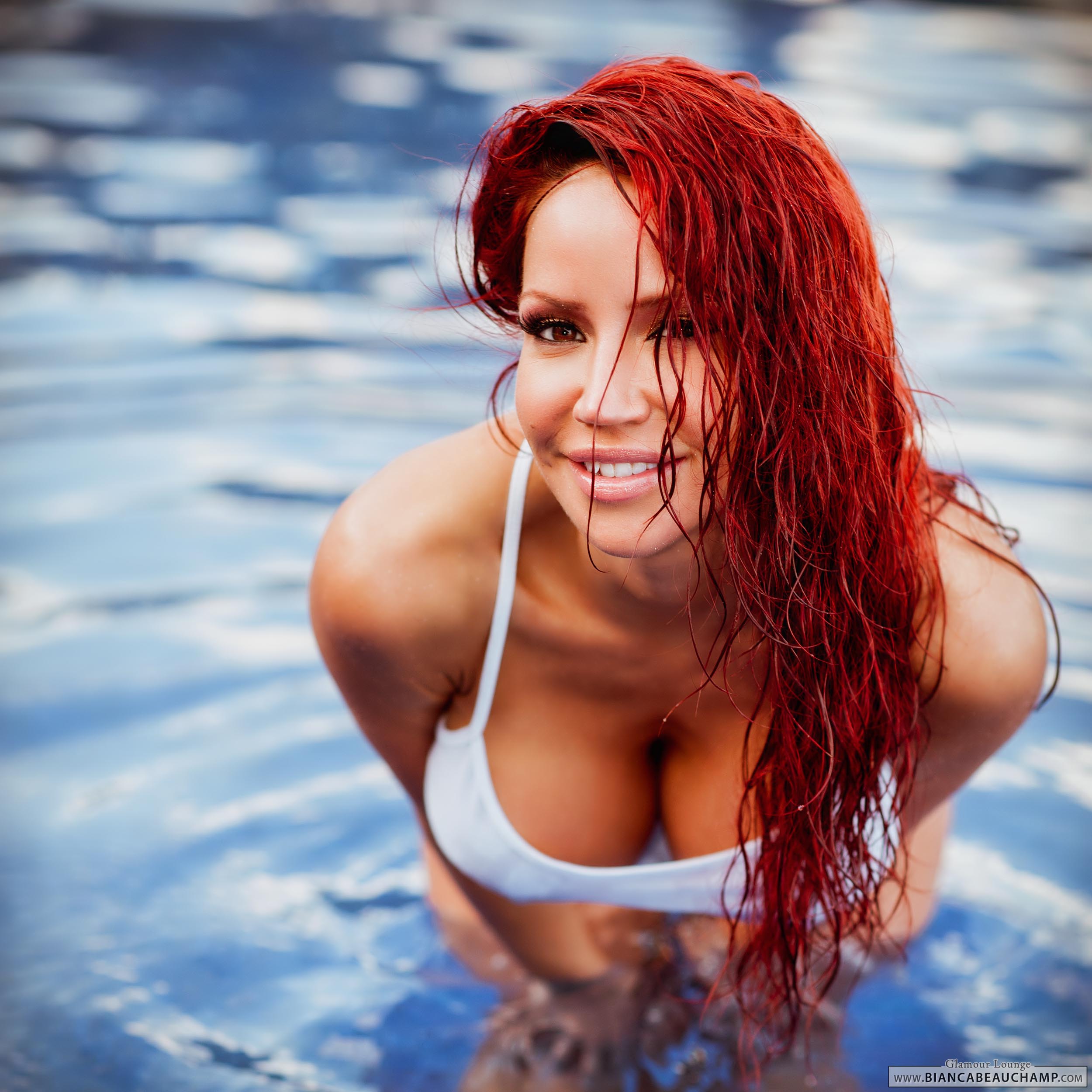 bianca_beauchamp breasts female large_breasts long_hair red_hair solo water watermark wet