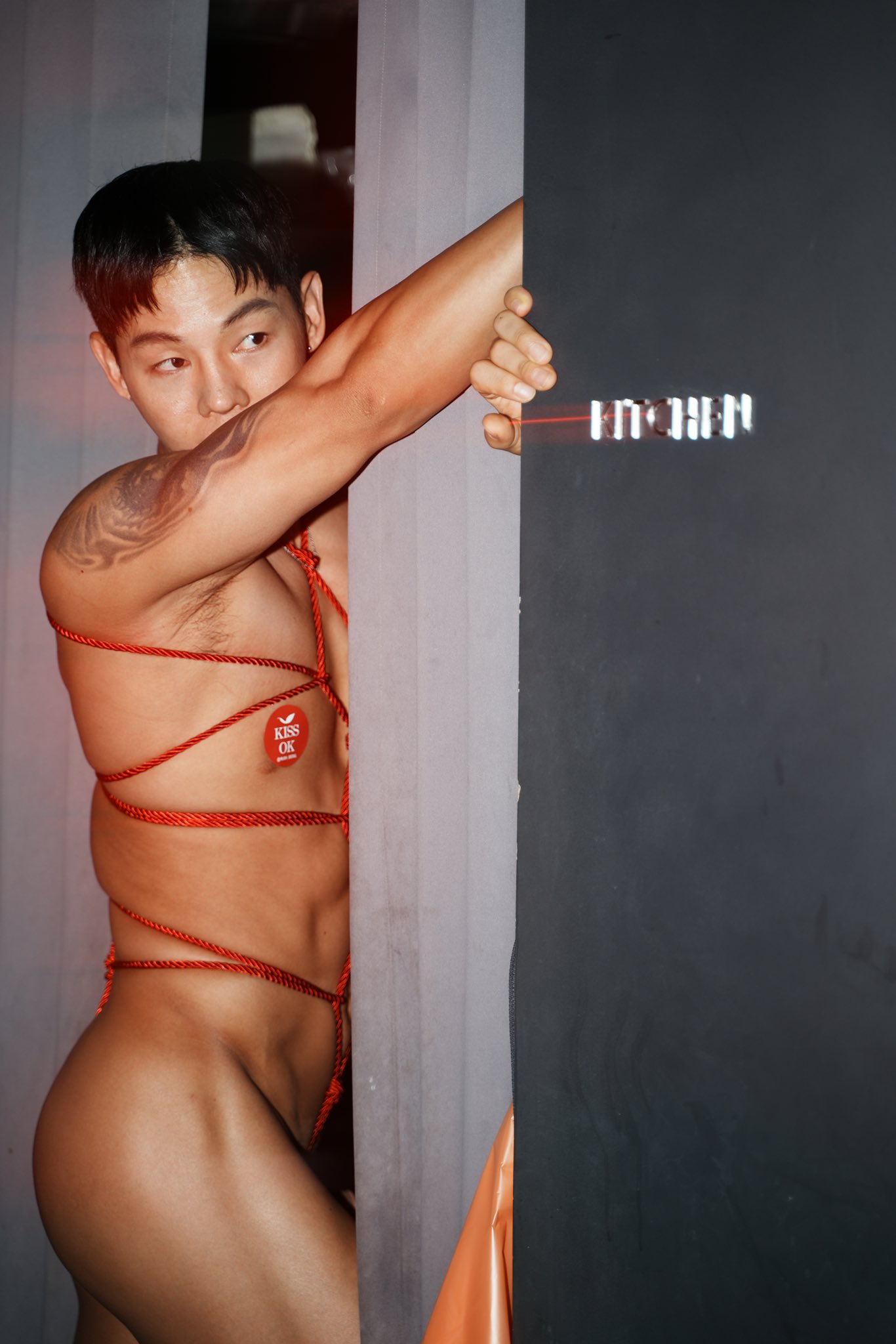 1boy asian asian_male ass black_hair gay male male_only muscular_male saeroi shibari solo solo_male sourced tattoo text twitter vertical_image