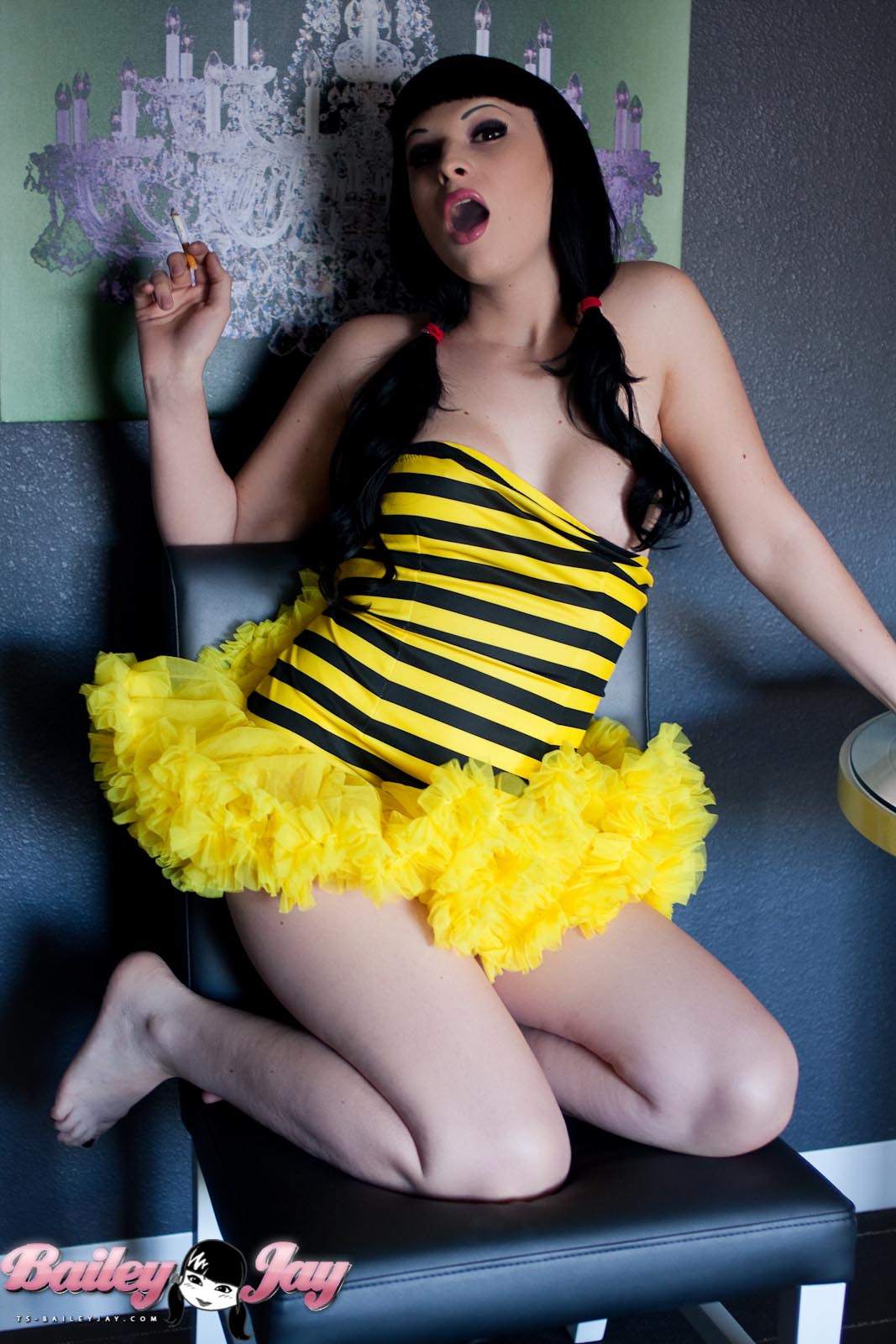 bailey_jay black_hair breasts cigarette dress large_breasts long_hair shemale solo watermark