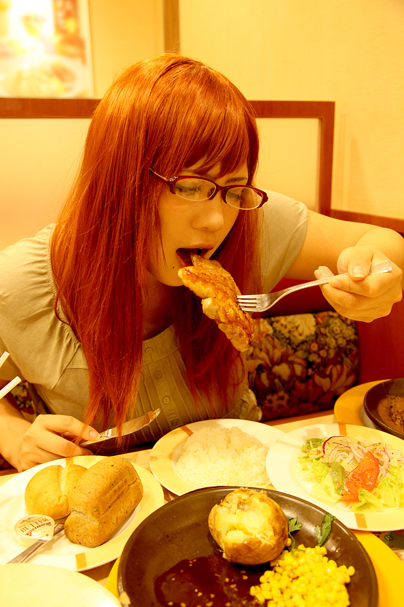 breasts brown_hair chouzuki_maryou female food glasses huge_breasts long_hair restaurant sitting solo watermark
