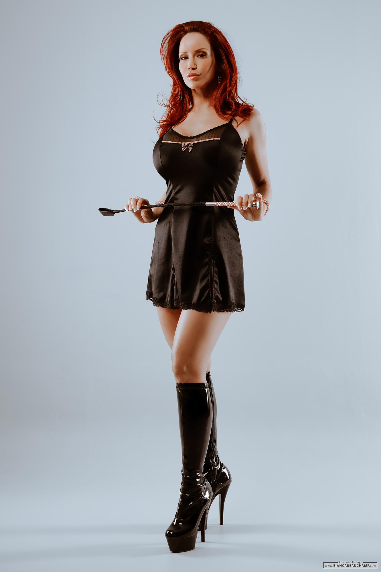 bianca_beauchamp breasts female large_breasts latex long_hair red_hair solo