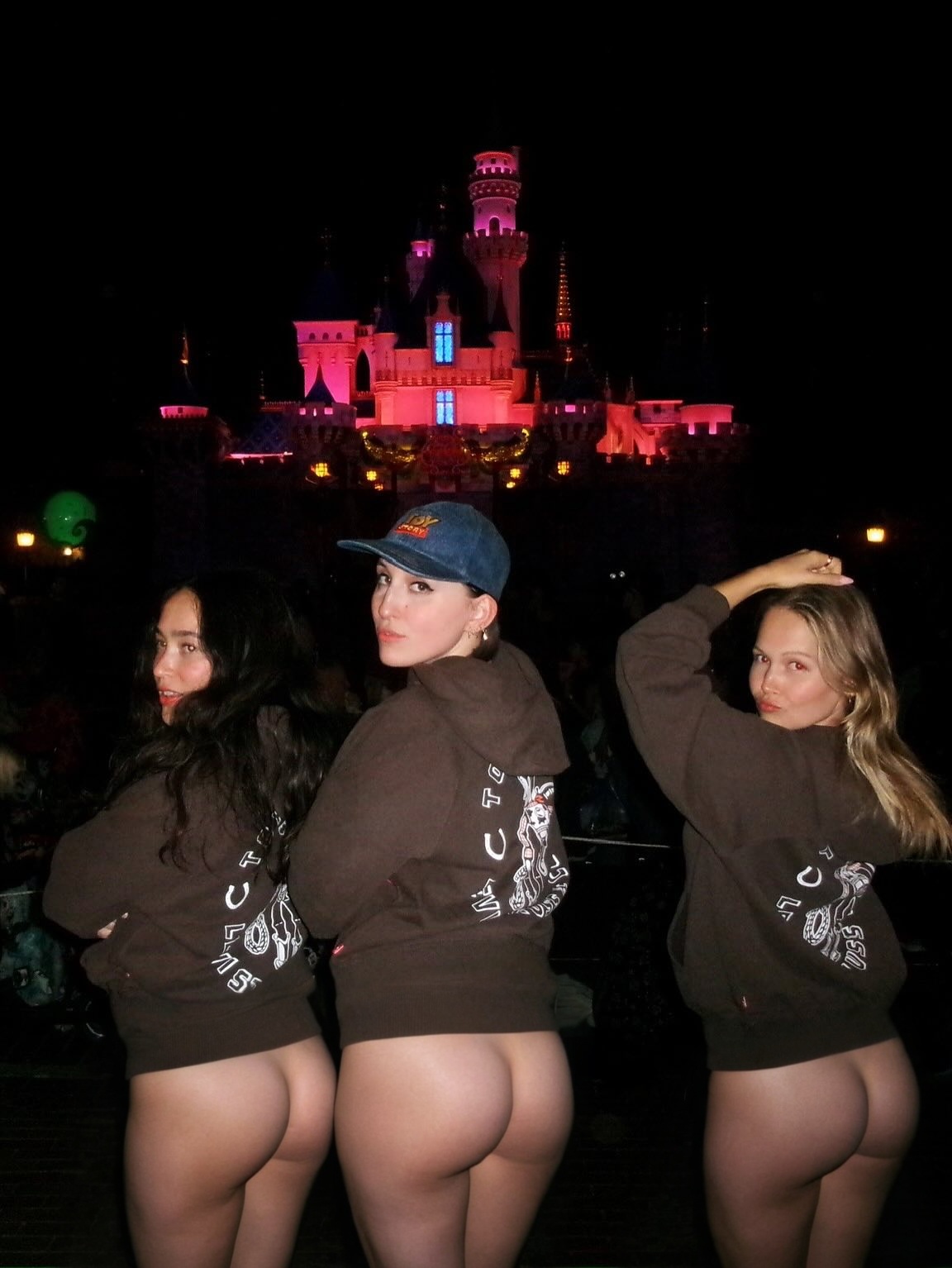 3girls actress arm_raised ass black_hair blonde blonde_hair bottomless celebrity ear_piercing earrings fake female female_focus female_only harley_quinn smith hat hoodie lipstick long_hair looking_at viewer looking_back makeup multiple_girls outside piercing presenting_ass public standing