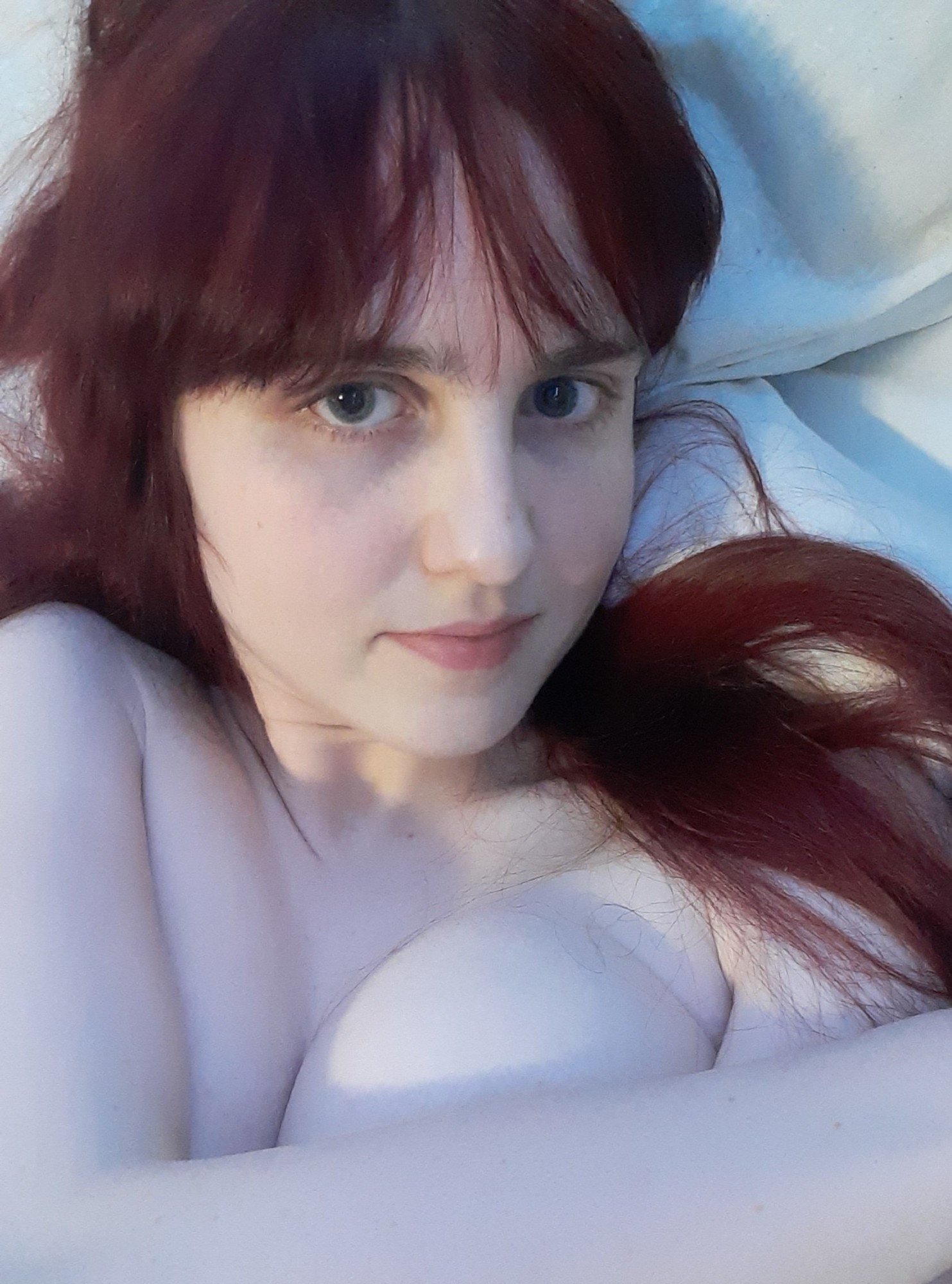 babyface bangs blue_eyes bluesky cute dyed_hair egirl face fansly female female_only magicalmysticva no_makeup onlyfans red_hair selfie solo solo_female tease twitter voice_actor
