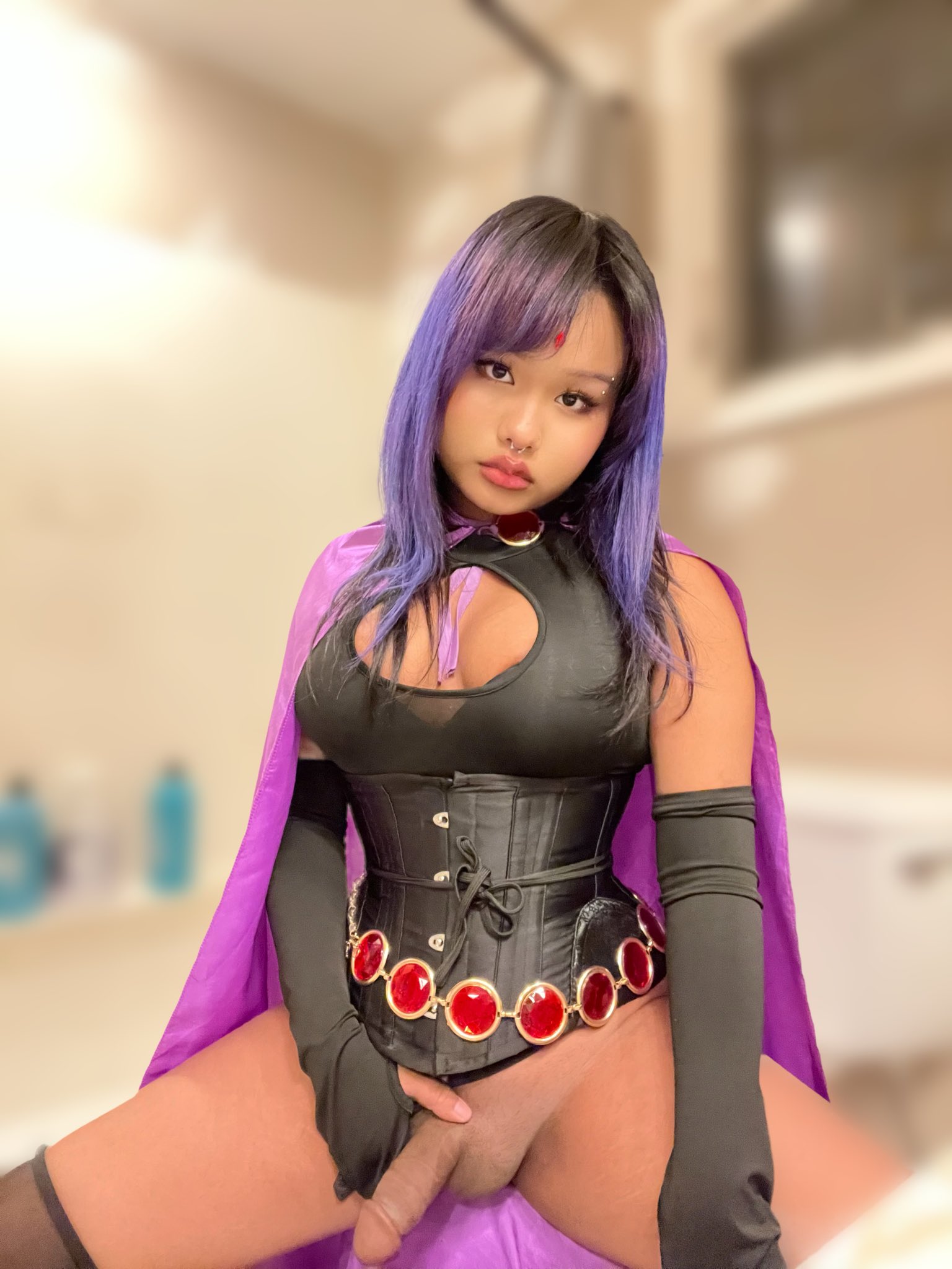 asian bbyyukki bed bedroom big_penis bottomless breasts cape cleavage cosplay dc dc_comics erection feminine goth highlights lipstick long_hair looking_at viewer makeup nose_piercing nose_ring on_bed penis piercing purple_hair raven septum_piercing sitting solo spread_legs teen_titans testicles transgender trap