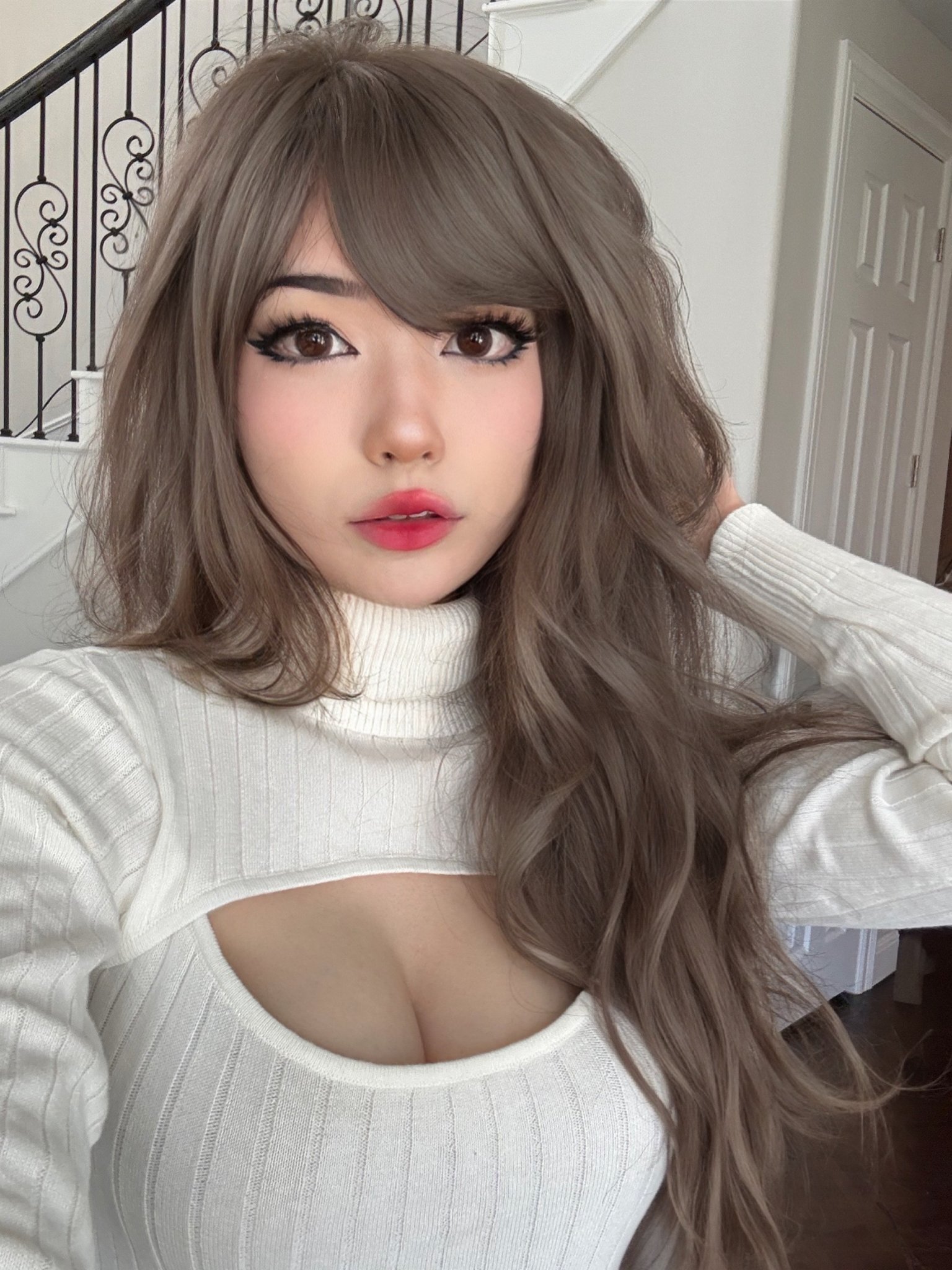 1girl asian asian_female breasts cleavage clothed emiru female female_only grey_hair indoors lipstick long_hair looking_at viewer non-nude selfie solo streamer sweater upper_body wig
