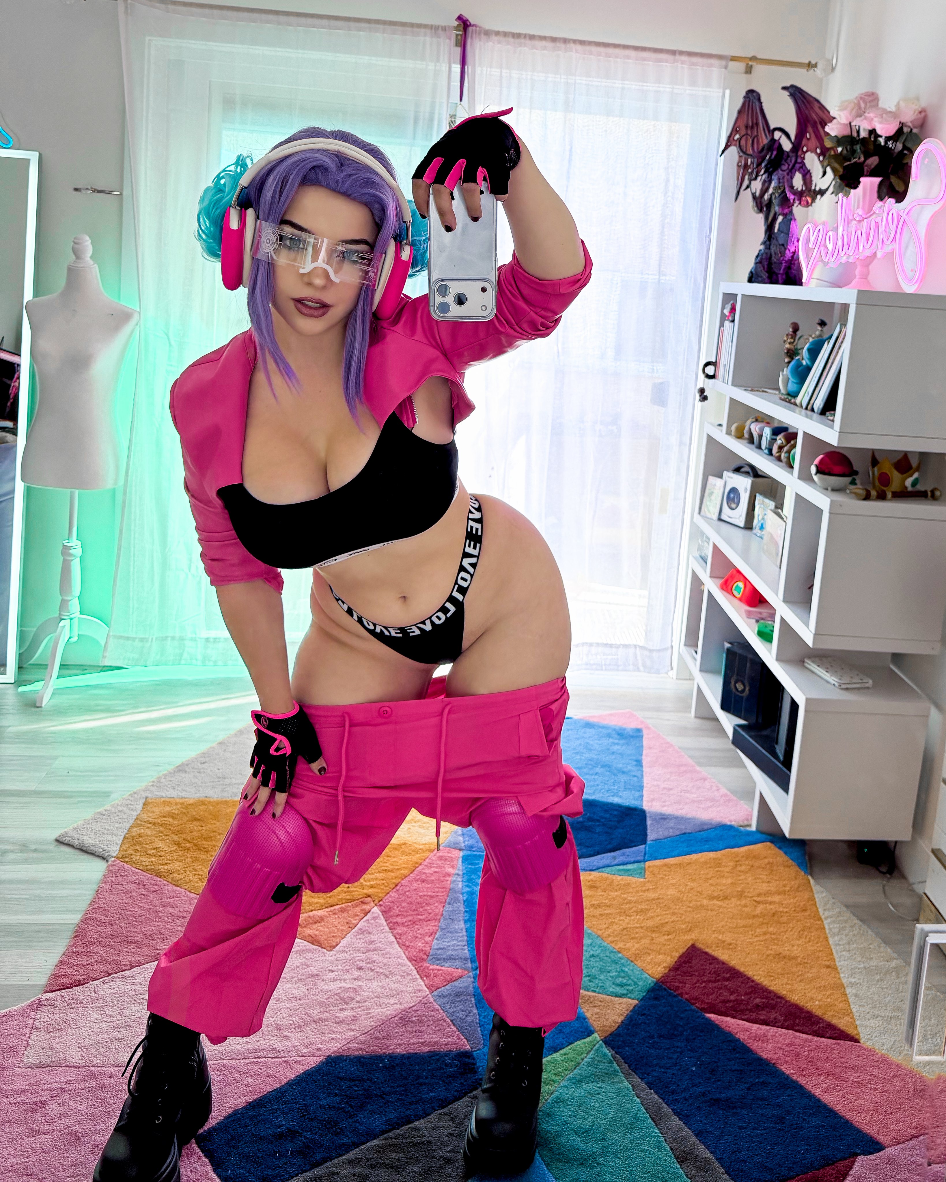 boots cellphone cosplay curtains fingerless_gloves goggles headphones large_breasts marvel marvel_rivals navel panties pants_down psyloque_(marvel) purple_hair room selfie serinide window