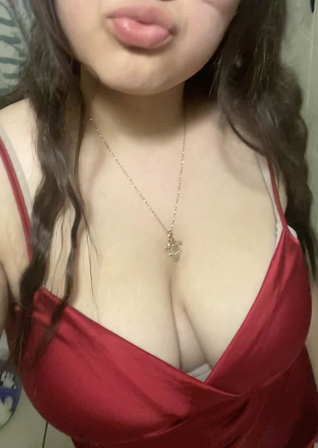 bra brunette lips necklace red_dress sexy teasing tits wavy_hair