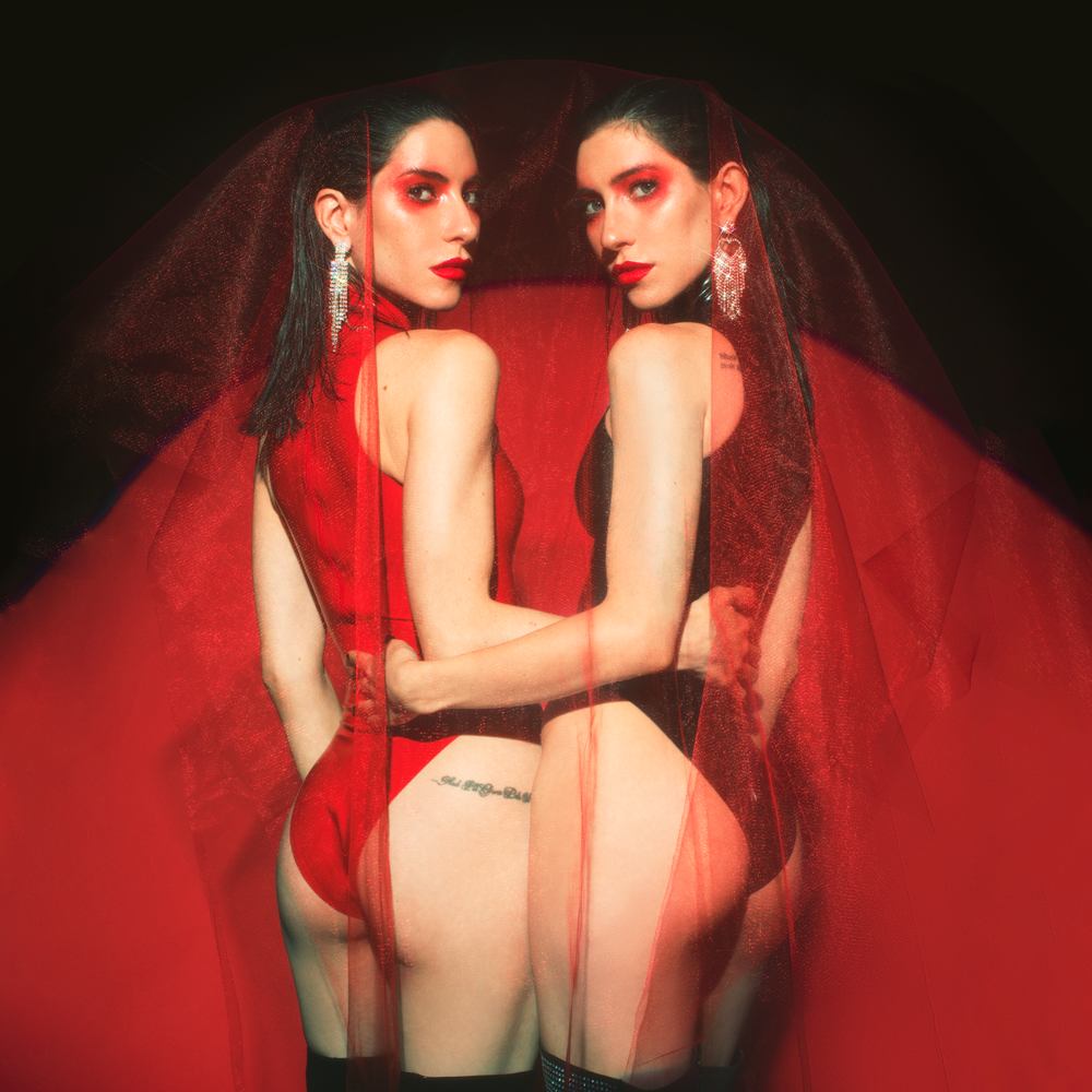 2girls ass celebrity clothed clothed_female earring female_only from_behind jessica_origliasso lisa_origliasso musician sisters the_veronicas twin_sisters twins