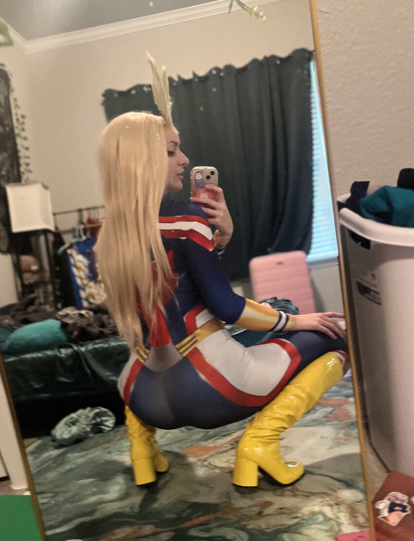 1girl all_might ass ass_focus cosplay from_behind genderswap ipeachysweet mirror_selfie my_hero_academia non-nude phone selfie smartphone solo squatting