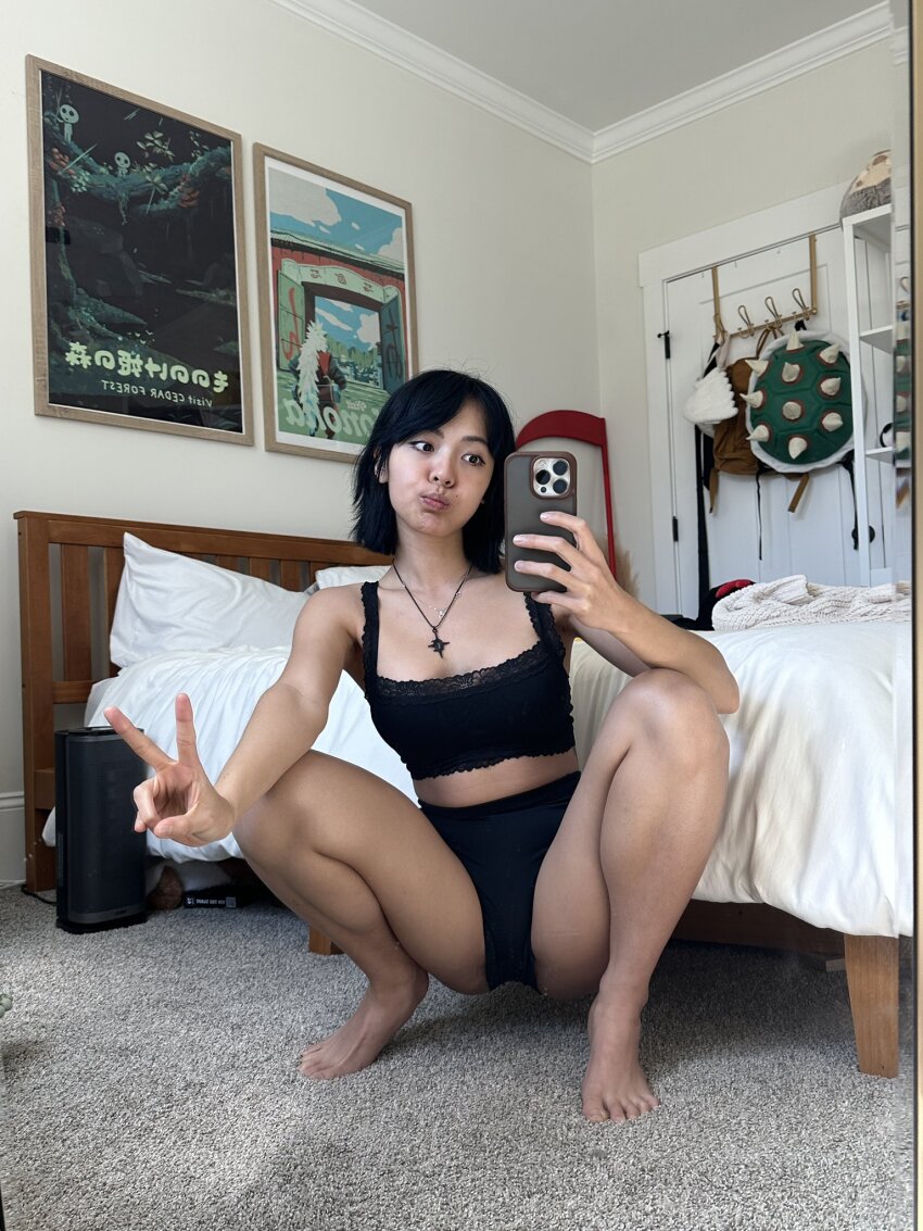 1girl barefoot bed bedroom black_hair cellphone chanco_cat dark-skinned_male feet female_focus female_only indoors legs midriff on_floor peace_sign petite phone photo selfie sfw shorts slim solo solo_female solo_focus sourced spread_legs squatting thighs twitter