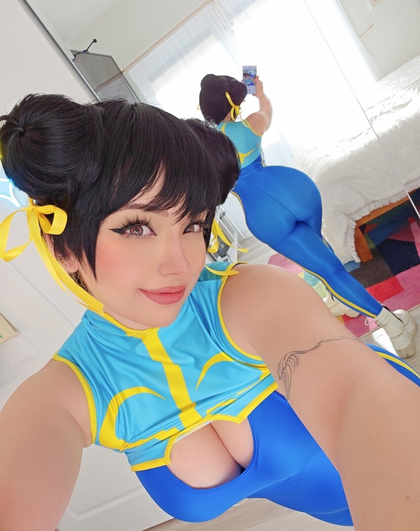 1girl ass big_ass chun-li cleavage cosplay female female_only large_breasts mirror mirror_selfie selfie serinide solo street_fighter