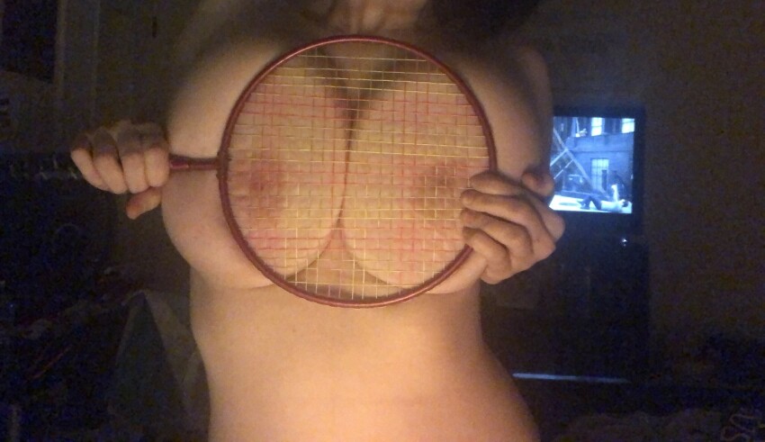 1girl big_breasts breast_focus breast_press cleavage completely_nude covering_breasts dark_hair faceless faceless_female female female_focus female_only female_solo megan_bitchell natural_breasts nipples nude nude_female solo solo_female solo_focus tennis_racket topless