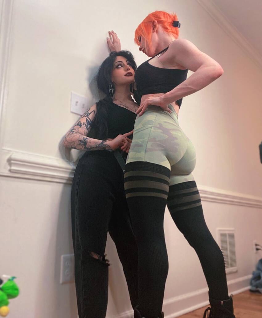 2girls ass ass_focus booty butt clothed clothed_female duo female_only femdom form_fitting height_difference instagram jennalynnmeowri leggings lesbian lilbatz non_nude orange_hair photo redhead skin_tight standing