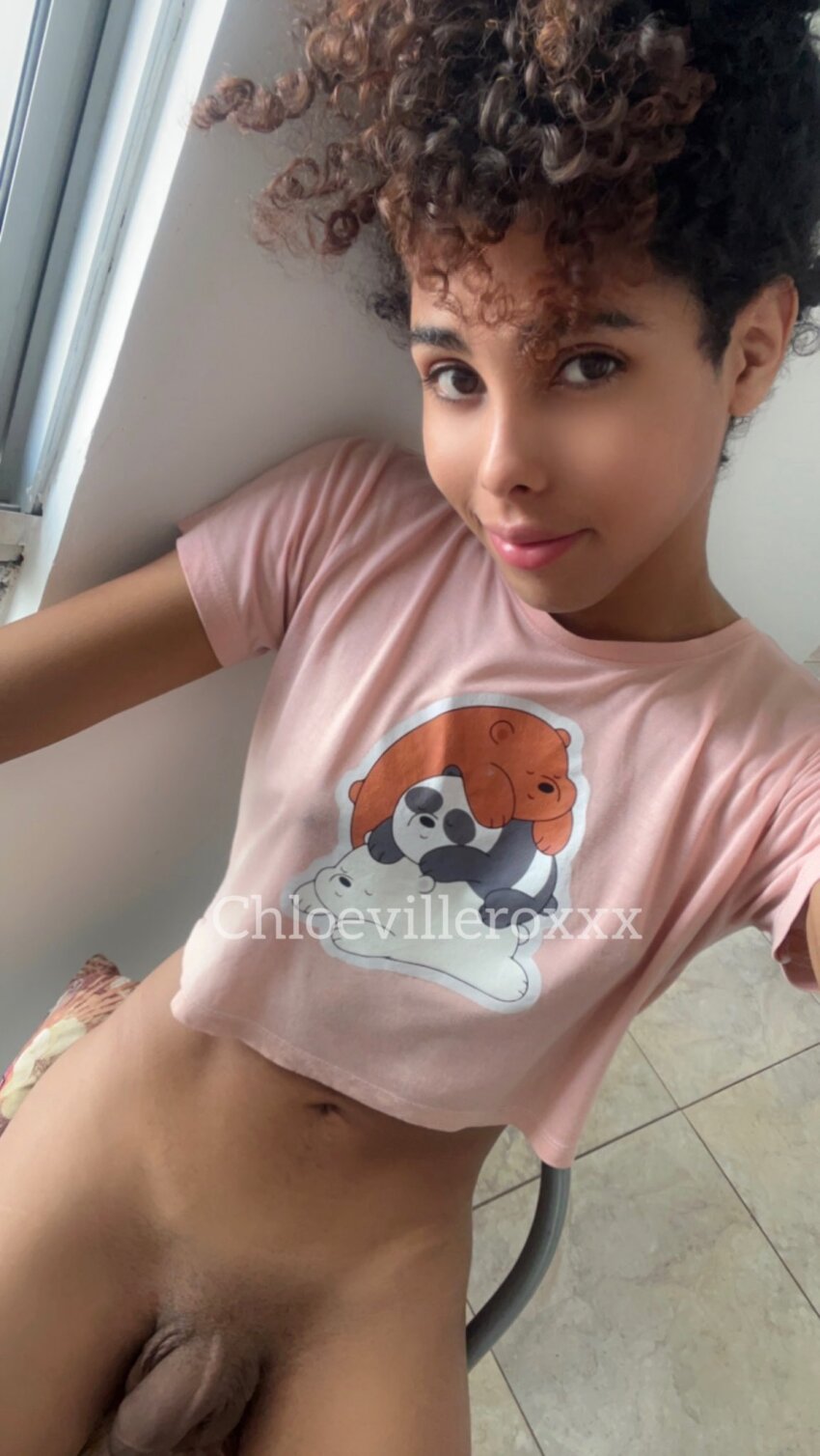 balls bottomless chloevilleroxxx crop_top curly_hair dark_hair hair_up looking_at_viewer partially_clothed penis selfie shirt smile solo tan_skin trans_female transgender watermark