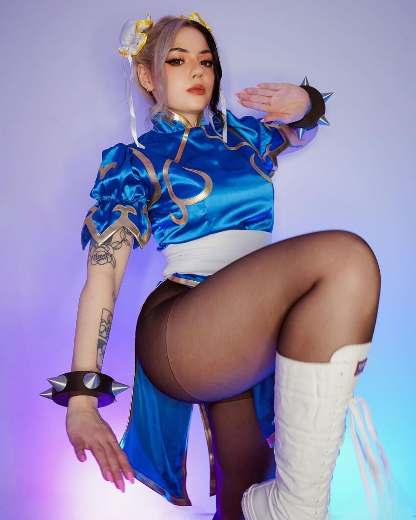 1girl china_dress chun-li cosplay female kaezuko pantyhose solo street_fighter tattoo thick_thighs