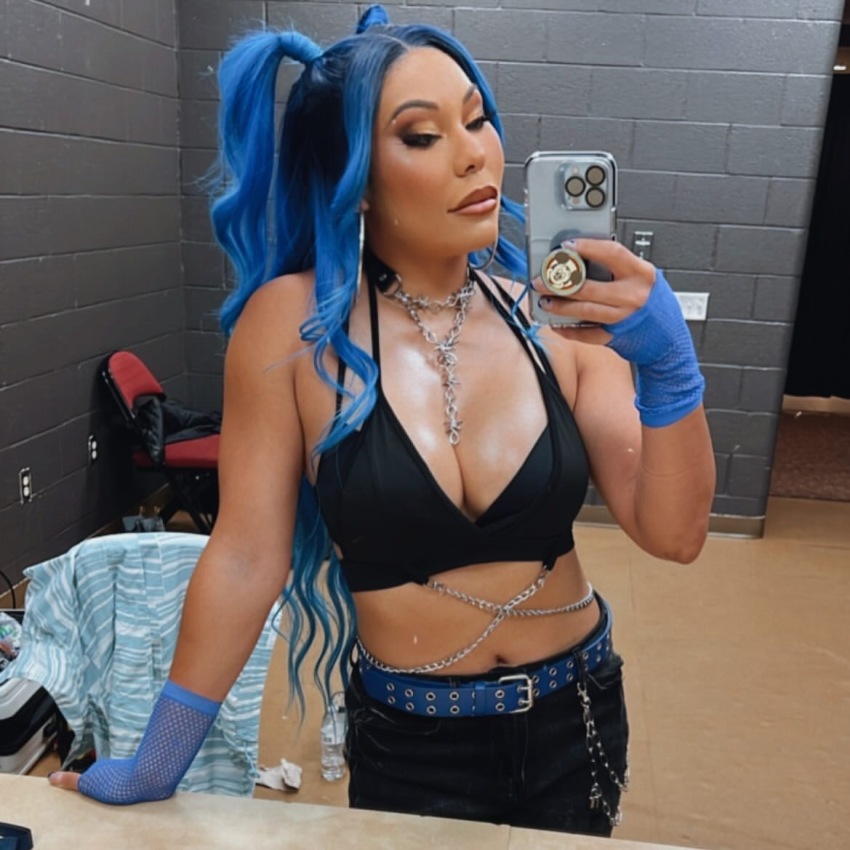 1girl asian asian_female big_breasts cleavage clothed female female_only mia_yim mixed_female multicolored_hair non-nude photo selfie solo wrestler wwe