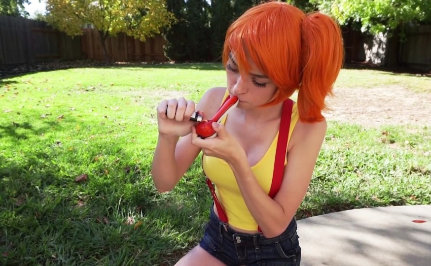 1girl cosplay haley420 marijuana misty_(pokemon) orange_wig pokeball_pipe pokemon pokemon_(classic_anime) stoner_girl suspenders weed white_female youtuber