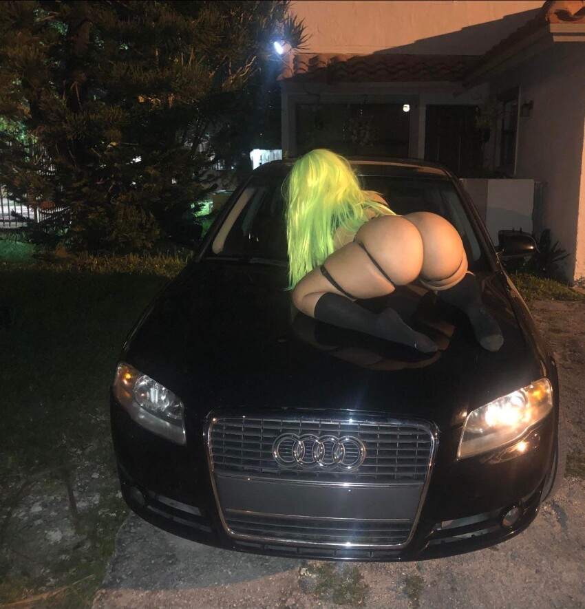 1girl big_ass car divinexdoll green_hair huge_ass night on_car reddit wig