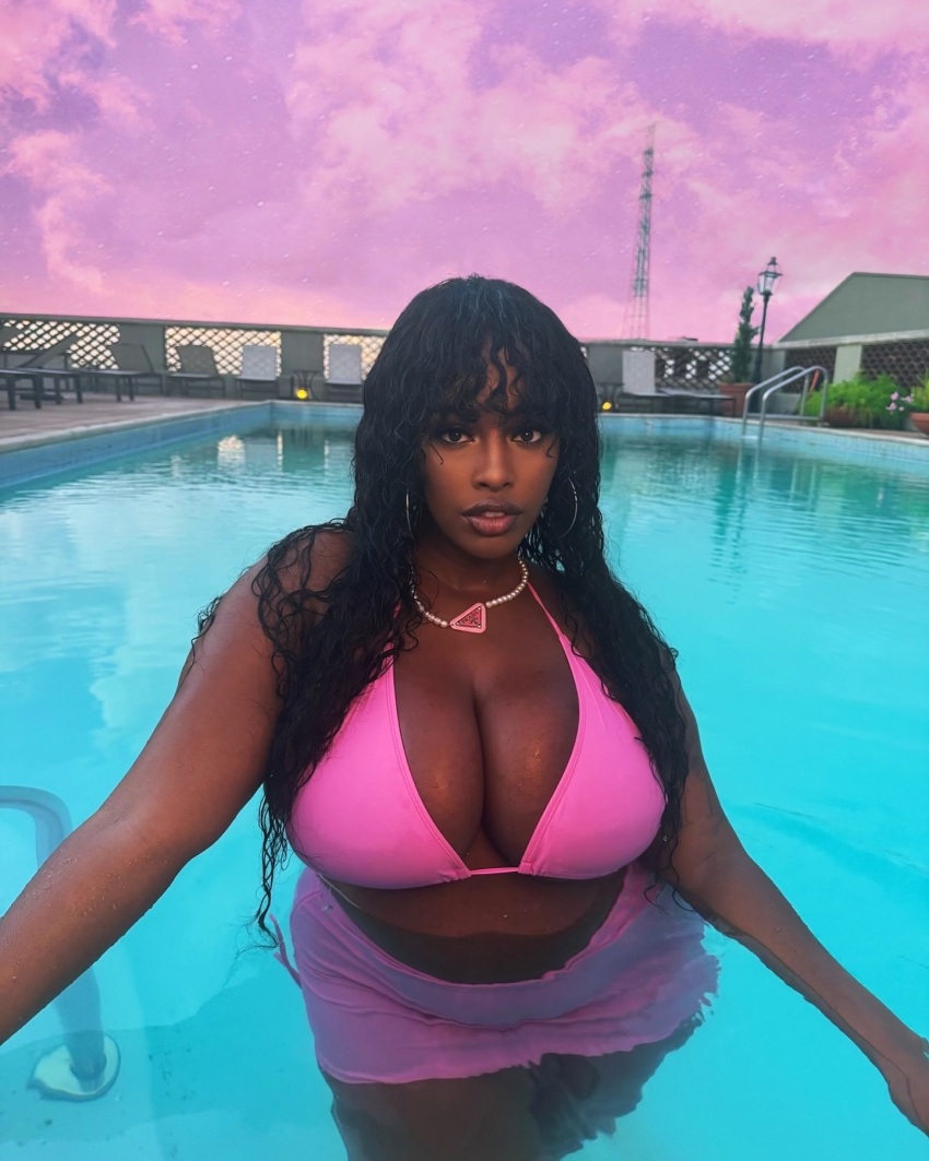 1girl bikini black black_female black_hair breasts clothed clothed_female collar curly_hair dark-skinned_female dark_skin huge_breasts looking_at_viewer medium_hair pool princesss_frenxh water wet wet_body wet_hair