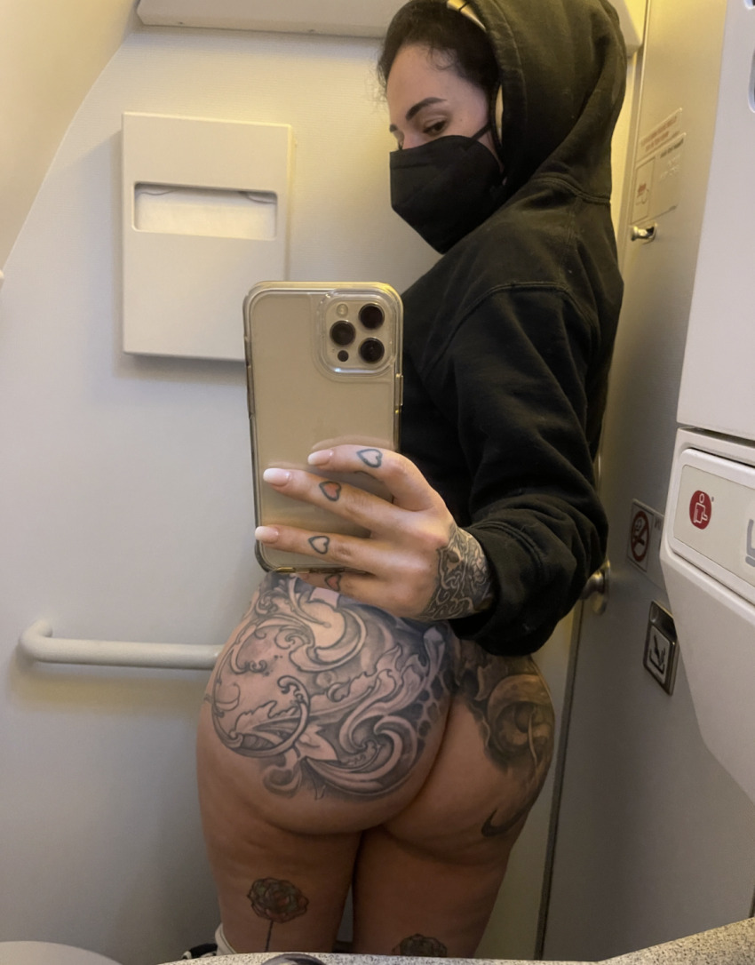 1girl airplane arabelle_raphael ass ass_focus bathroom big_ass black_hair bottom_heavy bottomless dark_hair facemask fat_ass female female_only hoodie jewish jewish_female large_ass long_nails looking_back mask mirror_selfie pants_down phone pornstar posing presenting_ass selfie tattoo tattoo_on_ass tattoos thighs white_nail_polish white_nails wide_hips