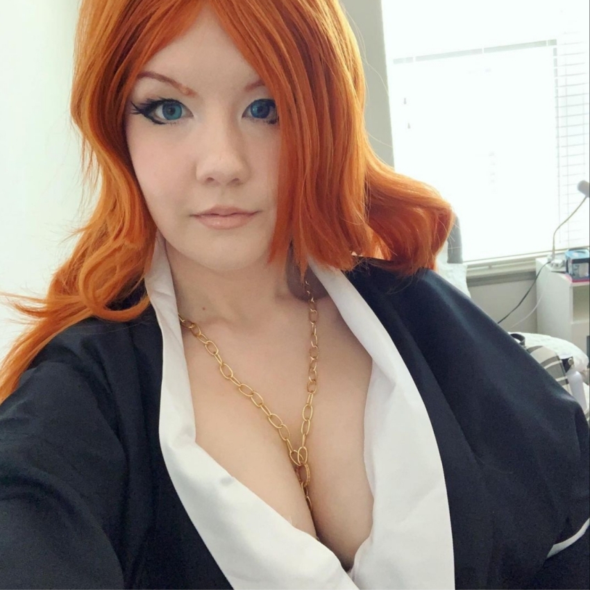 bleach bleach_(series) blue_eyes cosplay huge_breasts necklace necklace_between_breasts orange_hair rangiku_(bleach) rangiku_(cosplay) selfie spookyweebtrash