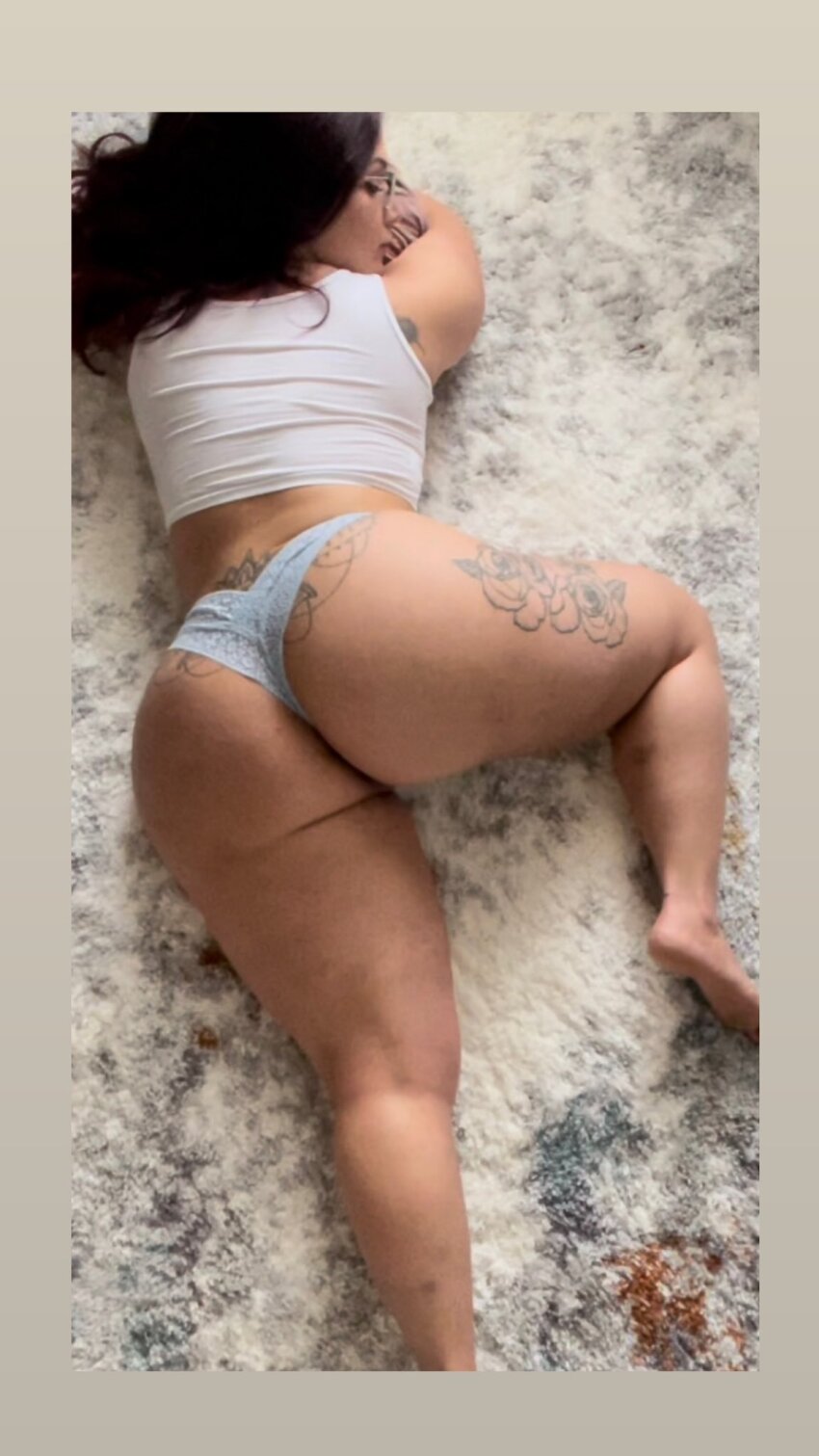 1girl americancake big_ass bottom_heavy female female_focus female_only laying long_hair panties pawg presenting_ass redhead solo tattoo_on_ass tattoo_on_thigh thick_thighs twitter undershirt white_female