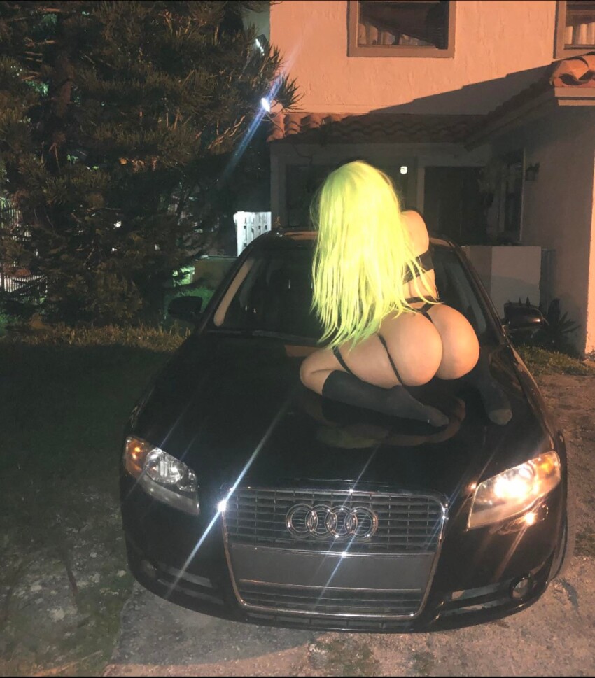 1girl big_ass car divinexdoll green_hair huge_ass night on_car reddit wig