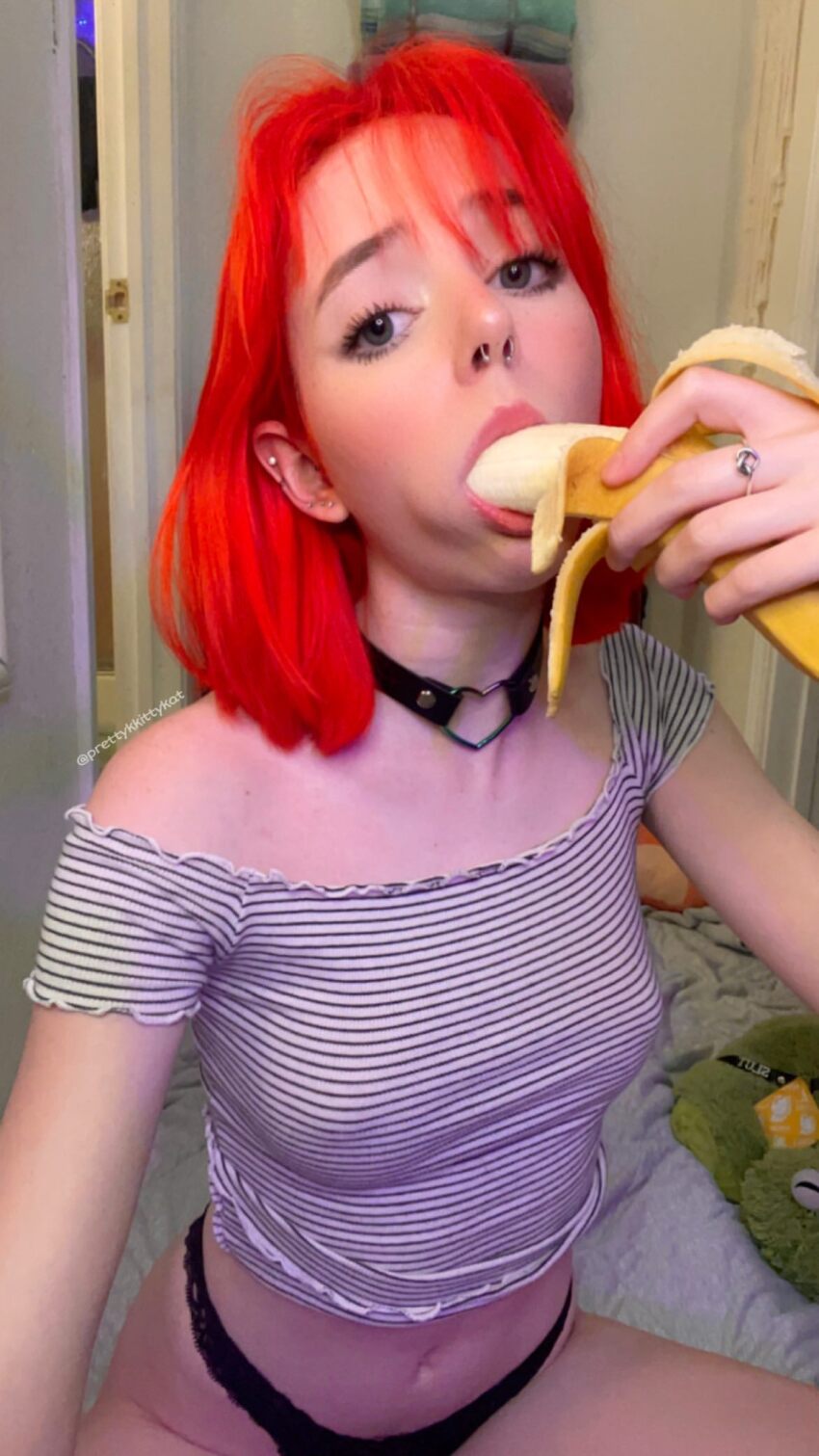 1girl banana banana_in_mouth belly belly_button caucasian caucasian_female dyed_hair female_focus female_only highres looking_at_the_viewer looking_at_viewer navel oral_insertion oral_insinuation pale pale-skinned_female pale_skin phallic photo prettiestkkittykat red_hair redhead sexually_suggestive solo solo_female solo_focus suggestive suggestive_food white_female