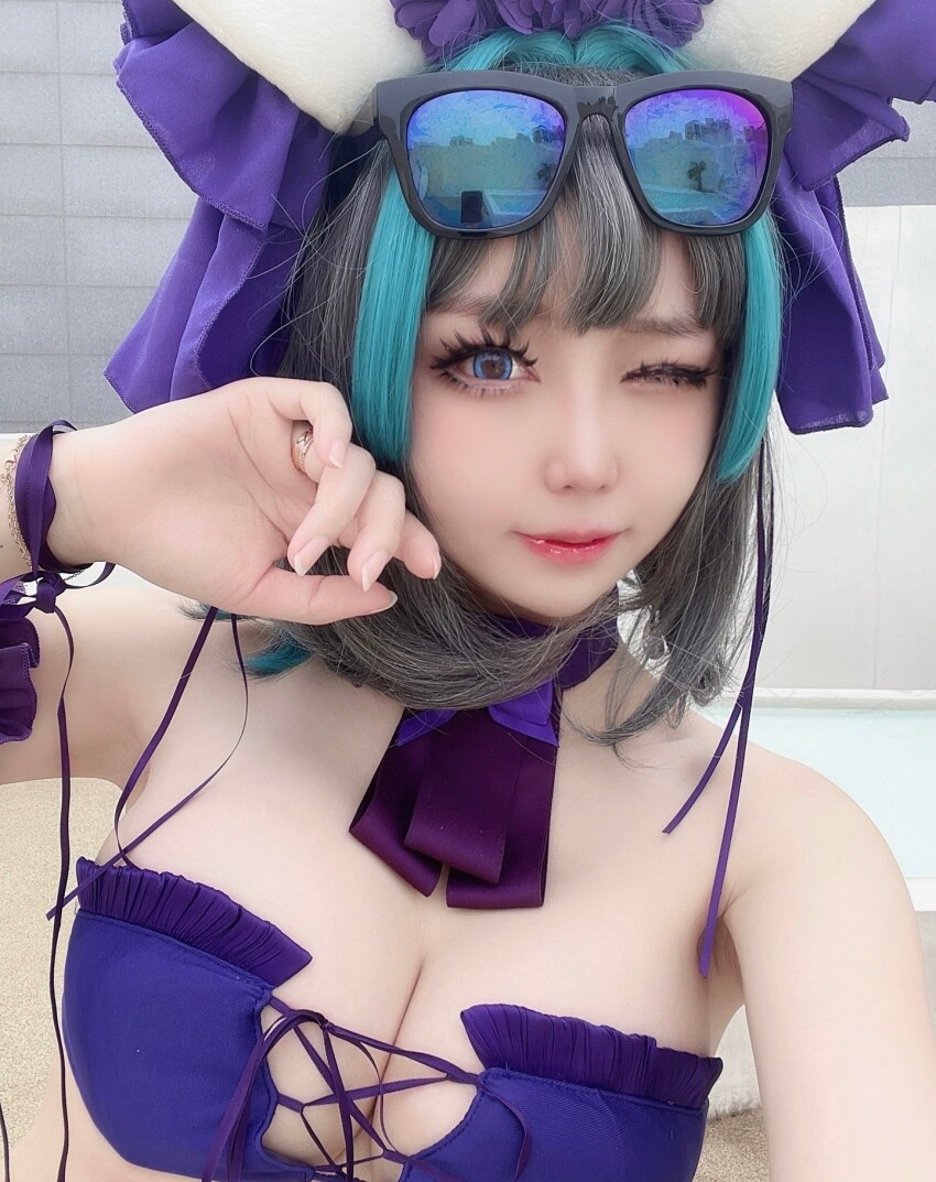 1girl ;) armpits asian azur_lane cheshire_(azur_lane) cleavage cos_euna cosplay large_breasts sunglasses sunglasses_on_head swimsuit wink