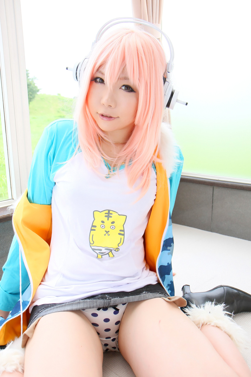 1girl asian breasts cosplay female headphones long_hair panties pink_hair solo super_sonico