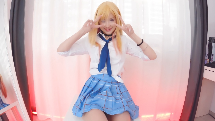 1girl cosplay double_v hidori_rose kitagawa_marin manyvids medium_breasts my_dress-up_darling sitting skirt sono_bisque_doll_wa_koi_wo_suru white_female wink