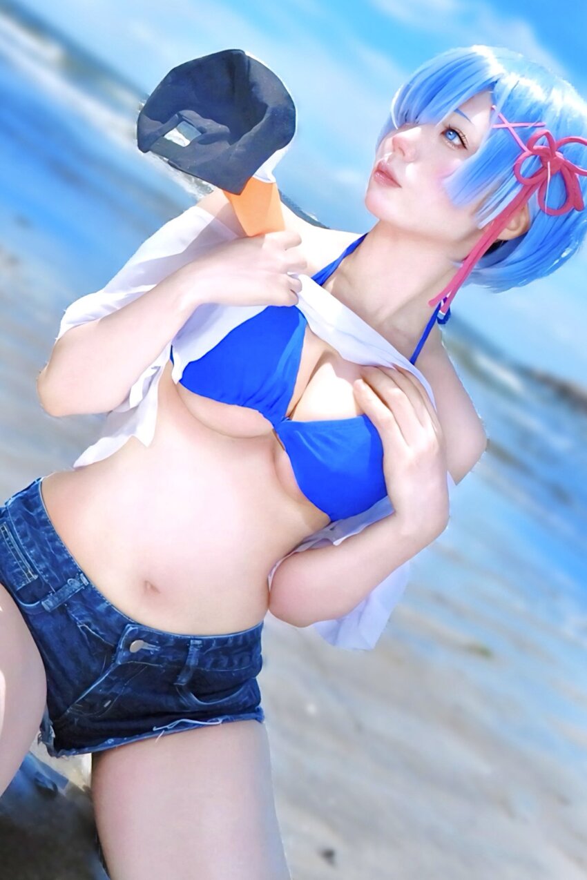 1girl bikini bikini_top blue_eyes blue_hair breasts cosplay hair_ornament jean_shorts jeans large_breasts mole_(cosplayer) re:zero_kara_hajimeru_isekai_seikatsu rem_(re:zero) short_hair shorts solo