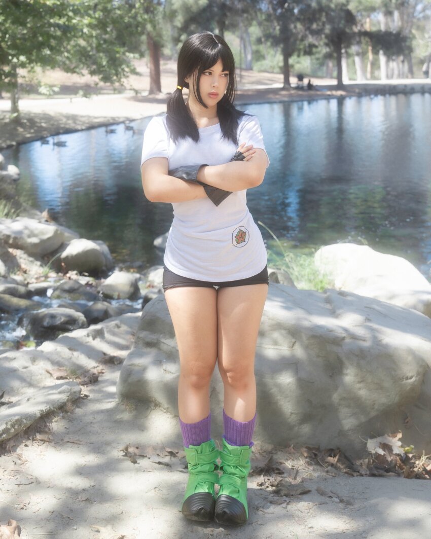 1girl arms_crossed asian black_hair black_shorts boots clothed cosplay dragon_ball dragonball_z female female_only fingerless_gloves full_body highres legs looking_away non-nude outside pigtails public_indecency real_life short_shorts shorts socks solo videl videl_(cosplay)